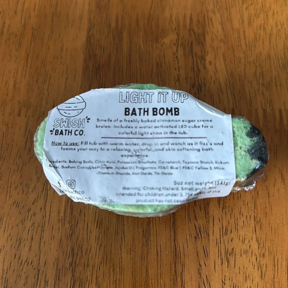Bath bomb. Christmas bulb design with Christmas cookie smell. Lights up